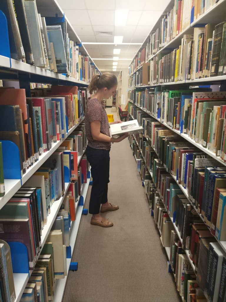 Assistant Curator Vanessa Thorne in the MAAS Research Library.